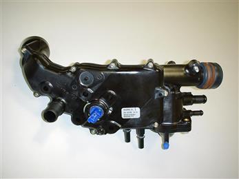 The Temperature Regulator Module (called BSE in French) is a complex device that distributes and controls the coolant fluid for the DW motors of the PSA Group. It integrates the thermostat, temperature sensor and the warming up circuit for the diesel oil. It is used, amongst others, for the new HDI engine of the Peugeot 607. Vyncolit X7010 was selected by Mark IV Systèmes Moteur S.A. (France) as the material of choice for the housing of the Temperature Regulator Module because the use of engineering mouldable phenolic composite allows the production of this part of more than 1kg by injection processing. 