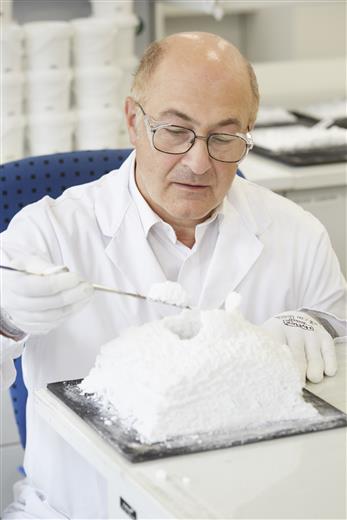 Exolit® AP flame retardant grades based on ammonium polyphosphate have become the industry standard in intumescent coatings formulations. Steel plate protected with intumescent coating after a fire test. (Photo: Clariant)