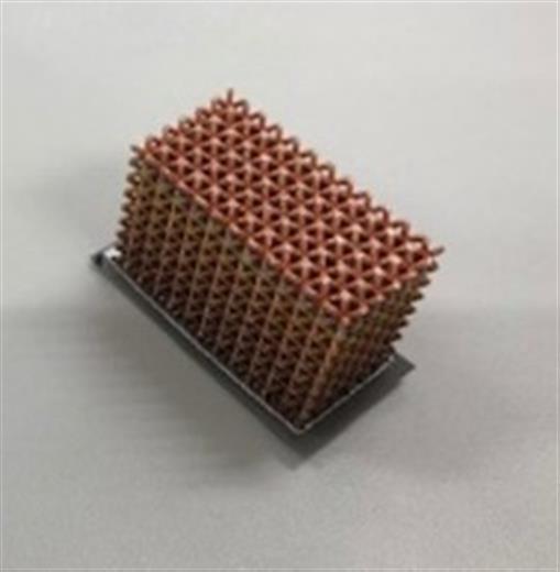 Example 2: Power devices for EVs need heatsinks. A small sized heatsink component is test-developed for each device. Prototype heatsinks printed in pure copper on the Concept Laser M2.
(Photo: JAMPT Corporation, GEADPR058)
