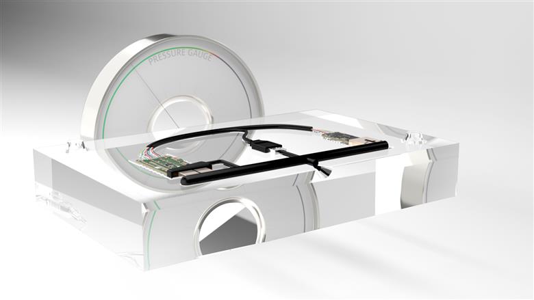 Low pressure molding process: The bare electronics are inserted into a predesigned mold set. Technomelt encapsulates electronics at low pressure. After molding, parts get tested and moved to final assembly. 
(Photo: Henkel, PR089)
