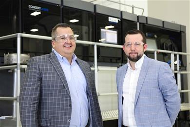 GE Additive M Line system installed at GE Aviation’s Additive Technology Center (ATC) in West Chester, OH. (L-R: Benito Trevino, general manager – additive integrated product team, GE Aviation and Chris Philp, ATC site leader, GE Aviation).
(Photos: GE Additive, GEADPR061)
